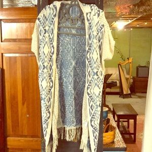 Soft knit shot sleeved pancho sweater